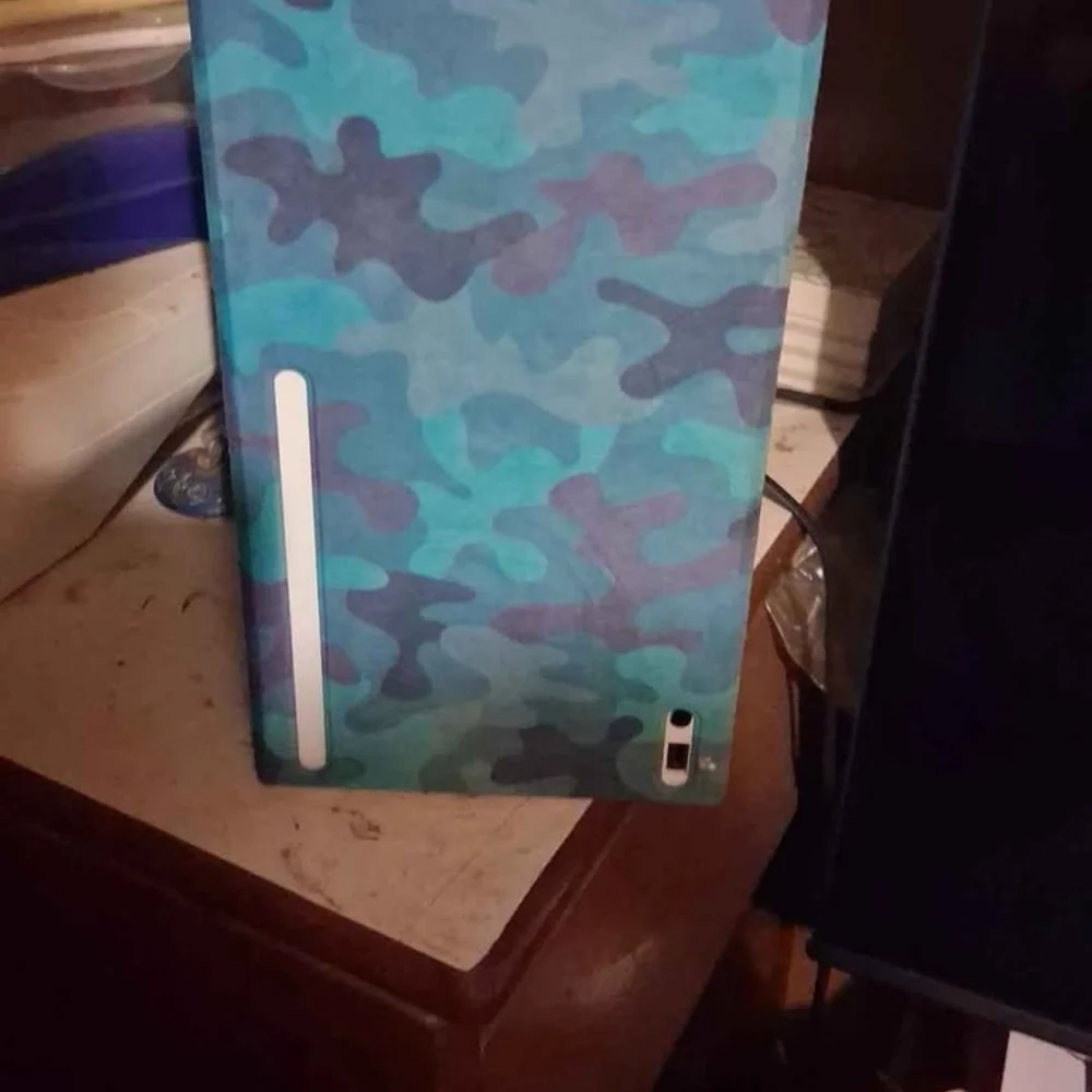 Microsoft Console with Blue and Purple Camouflage Design